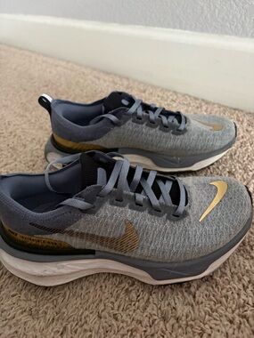 Nike blue and Gold Invincible Run 3 Trainer used